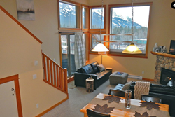 cozy canmore mountain condo in the Canadian rockies with panoramic mountain views in canmore, alberta, canada; pet friendly vacation condo in banff canada